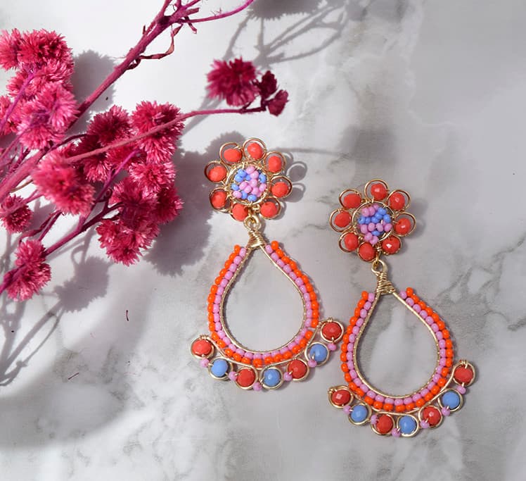 aretes largos de mostacilla